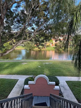 a view of a lake view with a garden
