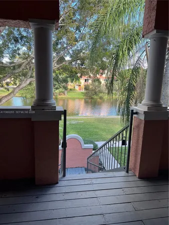 a view of a balcony with lake view