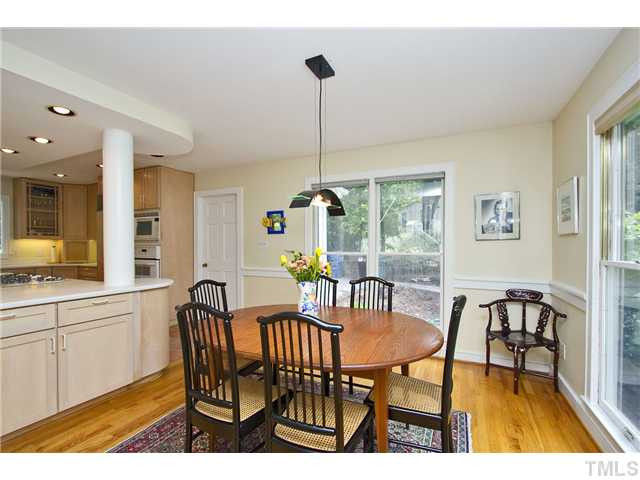 2700 Old Sugar Road Durham, NC 27707 - Photo 10 of 25 Dining Room is open to kitche. Utility room is the door off the kitchen area. Dining Room