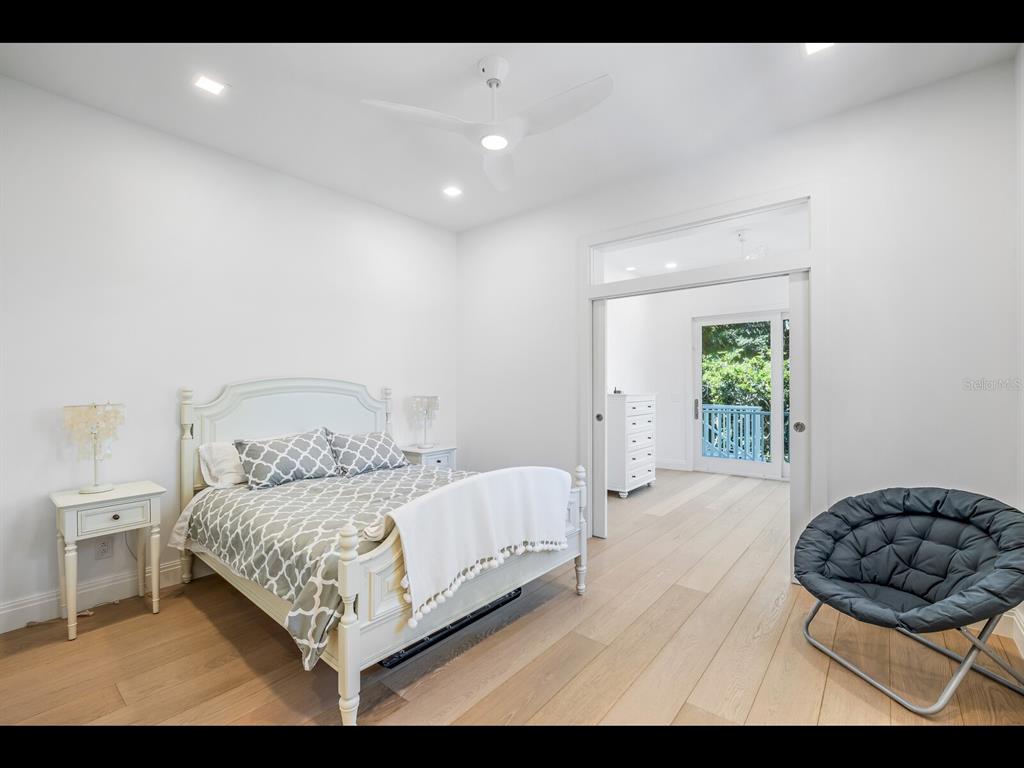2021 20th Street West Boca Grande, FL 33921 - Photo 37 of 66 a bedroom with a bed and a window