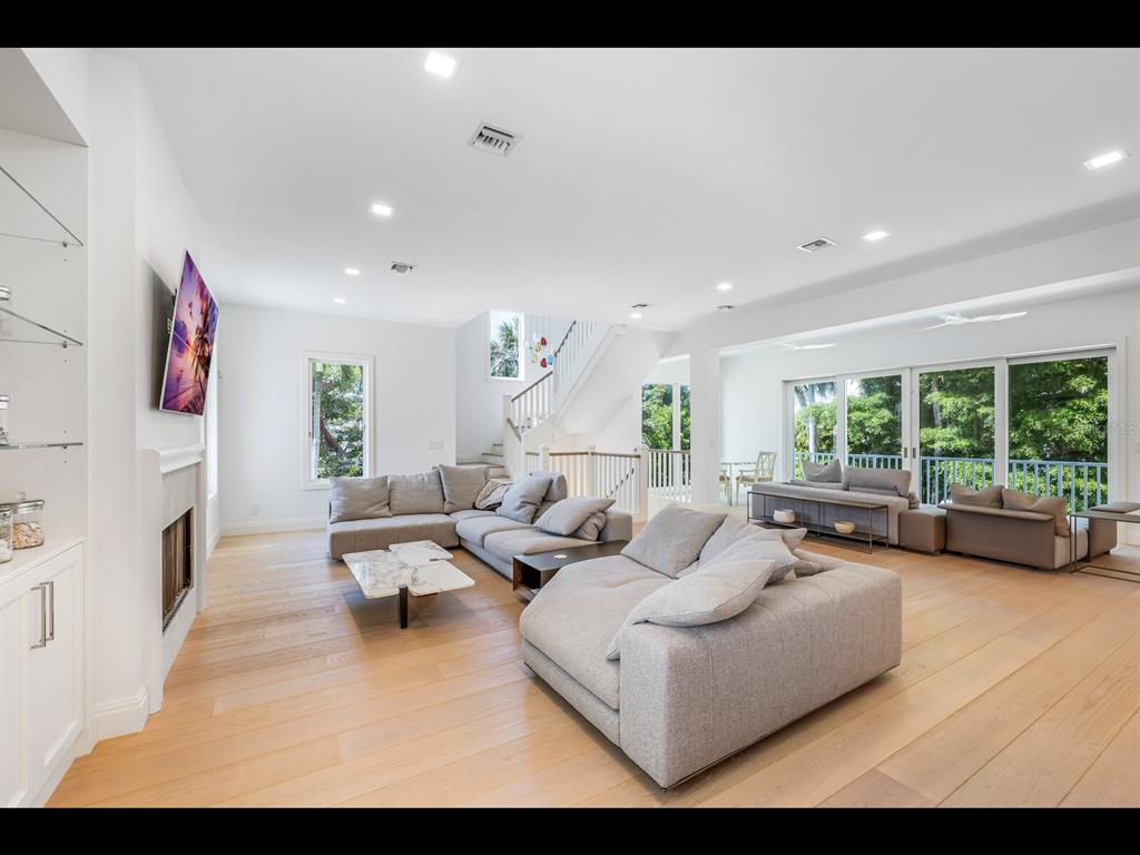 2021 20th Street West Boca Grande, FL 33921 - Photo 4 of 66 a living room with furniture and a large window