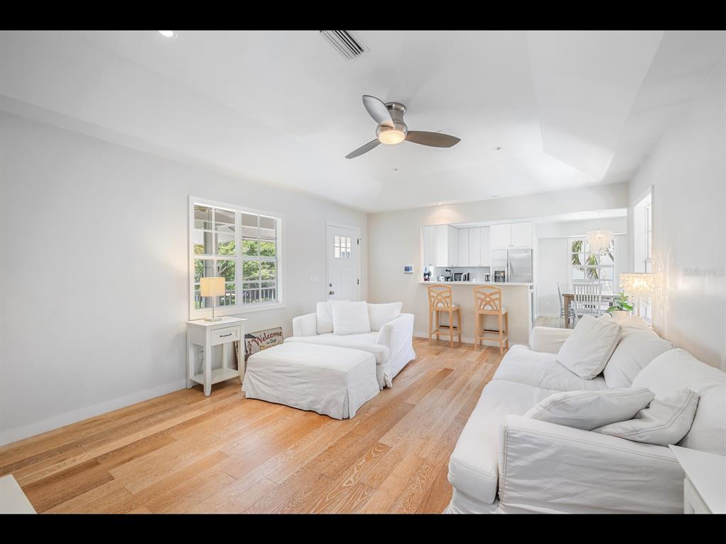 2021 20th Street West Boca Grande, FL 33921 - Photo 45 of 66 a bedroom with a large bed and a window