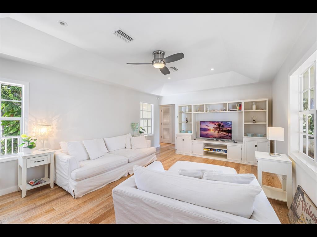 2021 20th Street West Boca Grande, FL 33921 - Photo 46 of 66 a living room with furniture and a flat screen tv