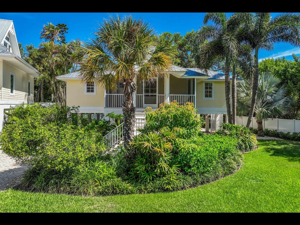2021 20th Street West Boca Grande, FL 33921 - Photo 58 of 66 a view of a house with a yard