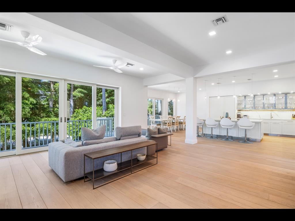 2021 20th Street West Boca Grande, FL 33921 - Photo 6 of 66 a living room with furniture and a large window