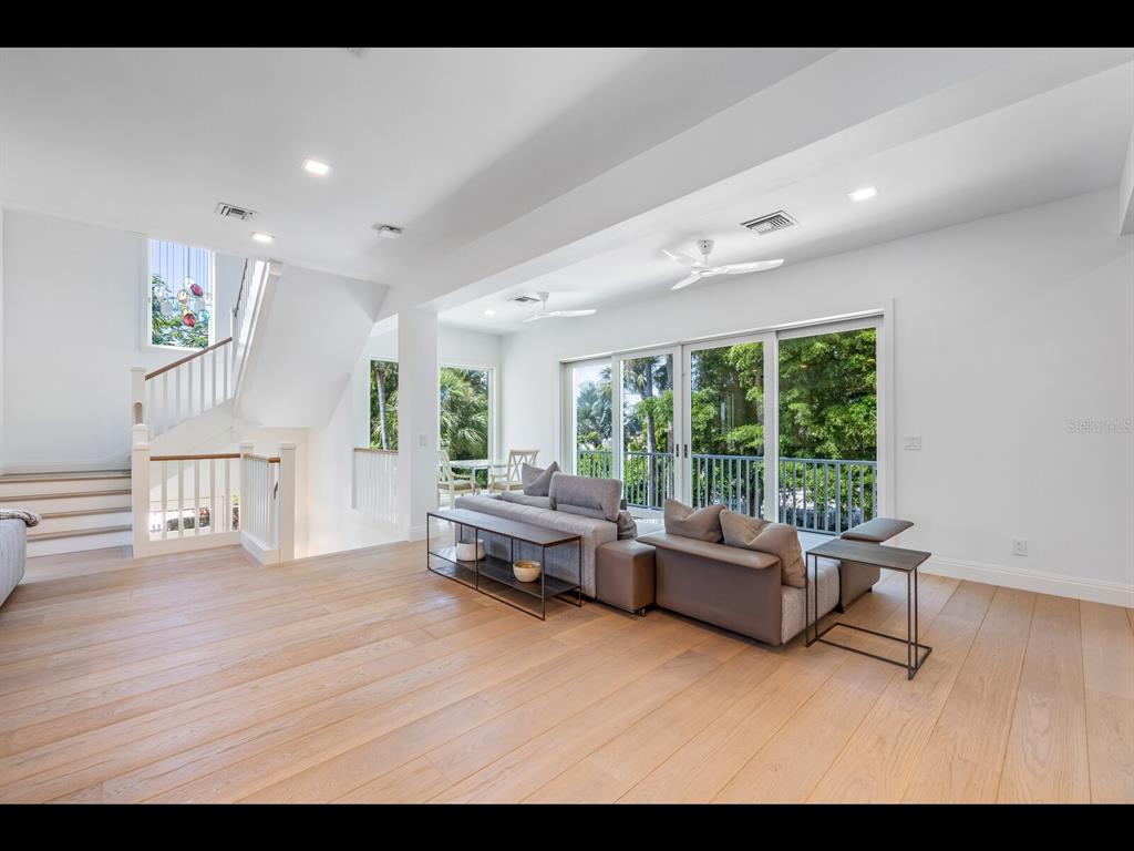 2021 20th Street West Boca Grande, FL 33921 - Photo 7 of 66 a living room with furniture and a large window