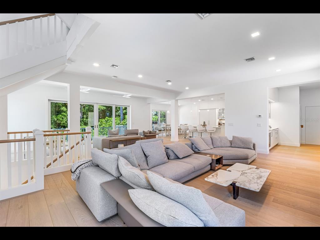 2021 20th Street West Boca Grande, FL 33921 - Photo 8 of 66 a living room with furniture and a large window