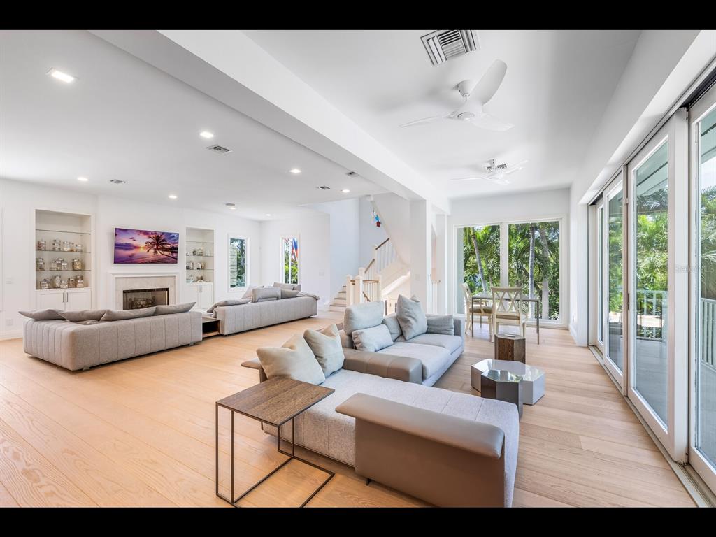 2021 20th Street West Boca Grande, FL 33921 - Photo 9 of 66 a living room with furniture and a large window