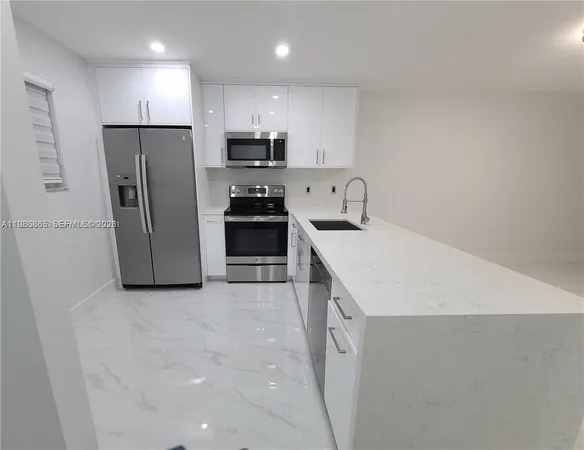 $2,450 | 7703 Camino Real, Unit A308, Miami, FL 33143