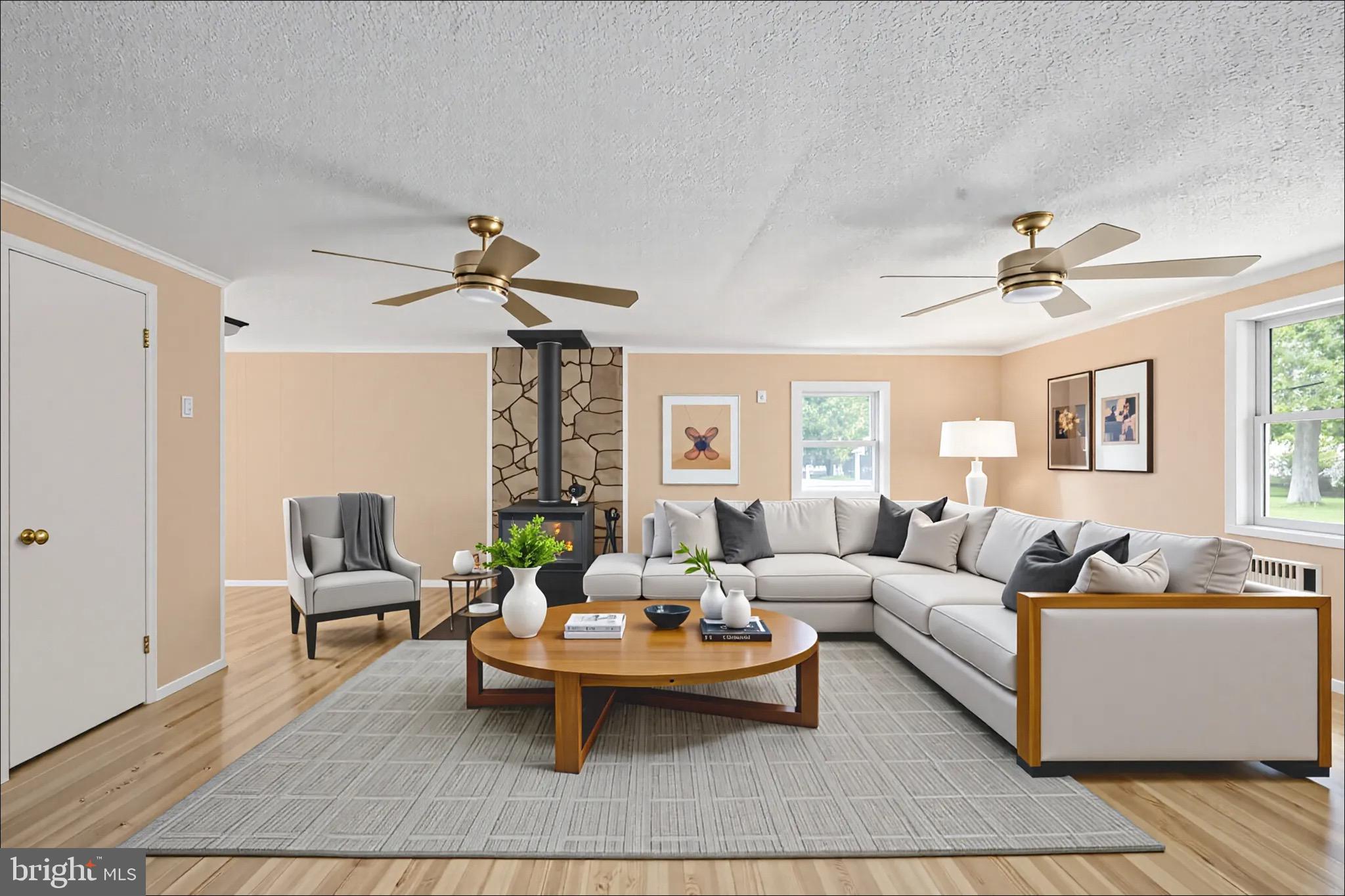 161 8th Street Colonial Beach, VA 22443 - Photo 13 of 71 a living room with furniture and a chandelier