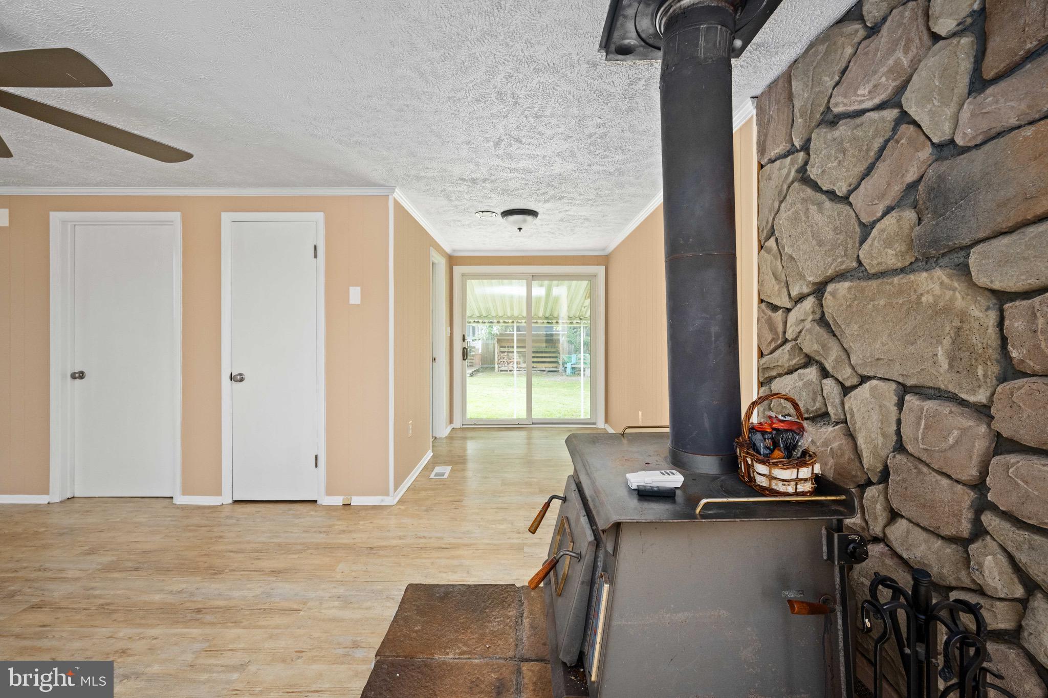 161 8th Street Colonial Beach, VA 22443 - Photo 18 of 71 a living room with furniture and a window