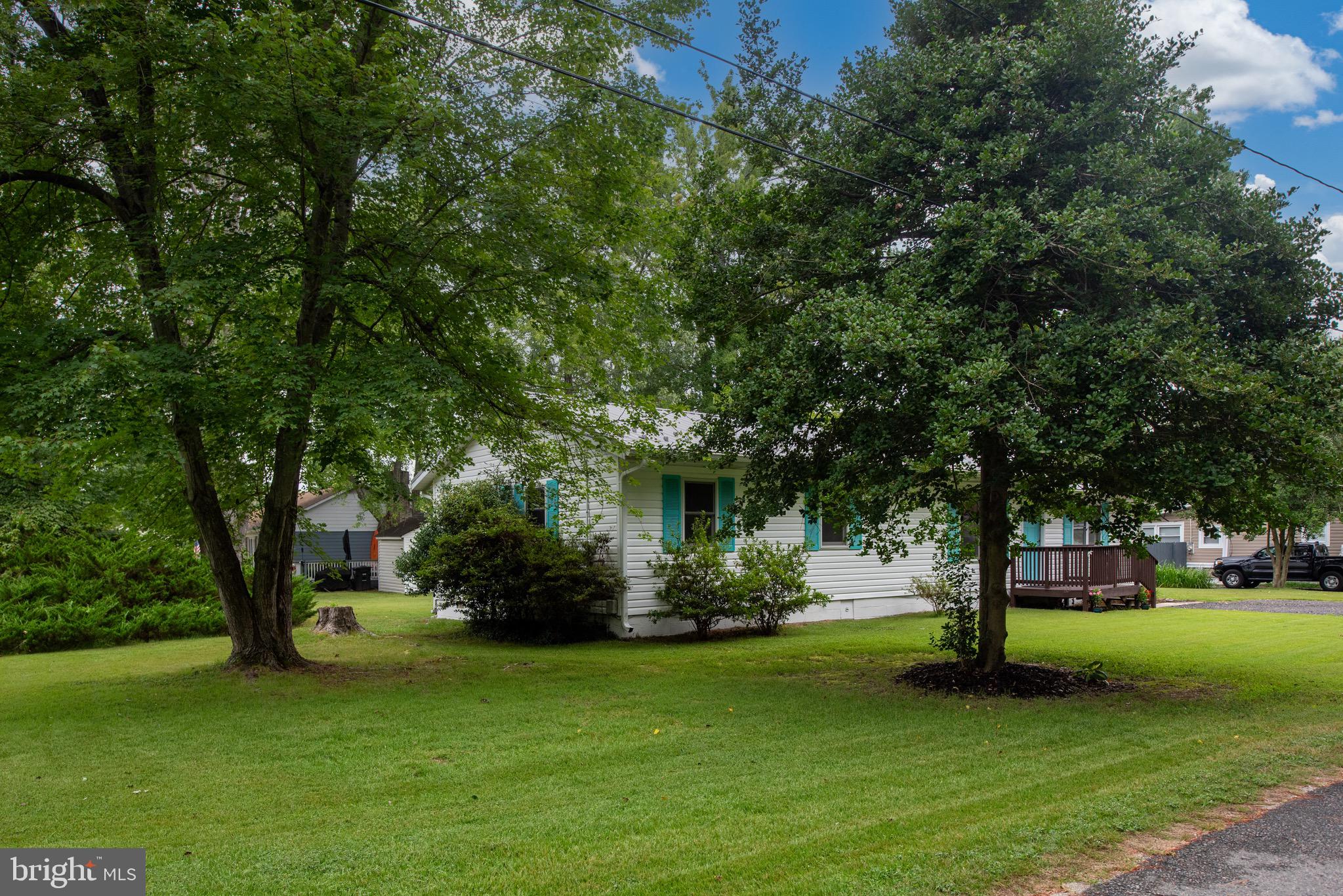 161 8th Street Colonial Beach, VA 22443 - Photo 2 of 71 a view of a garden with trees