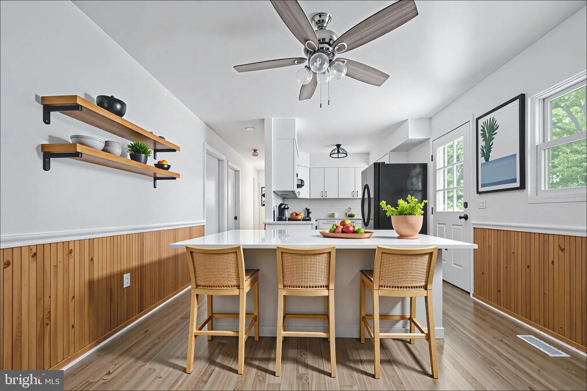 161 8th Street Colonial Beach, VA 22443 - Photo 20 of 71 a view of a dining room with furniture and wooden floor