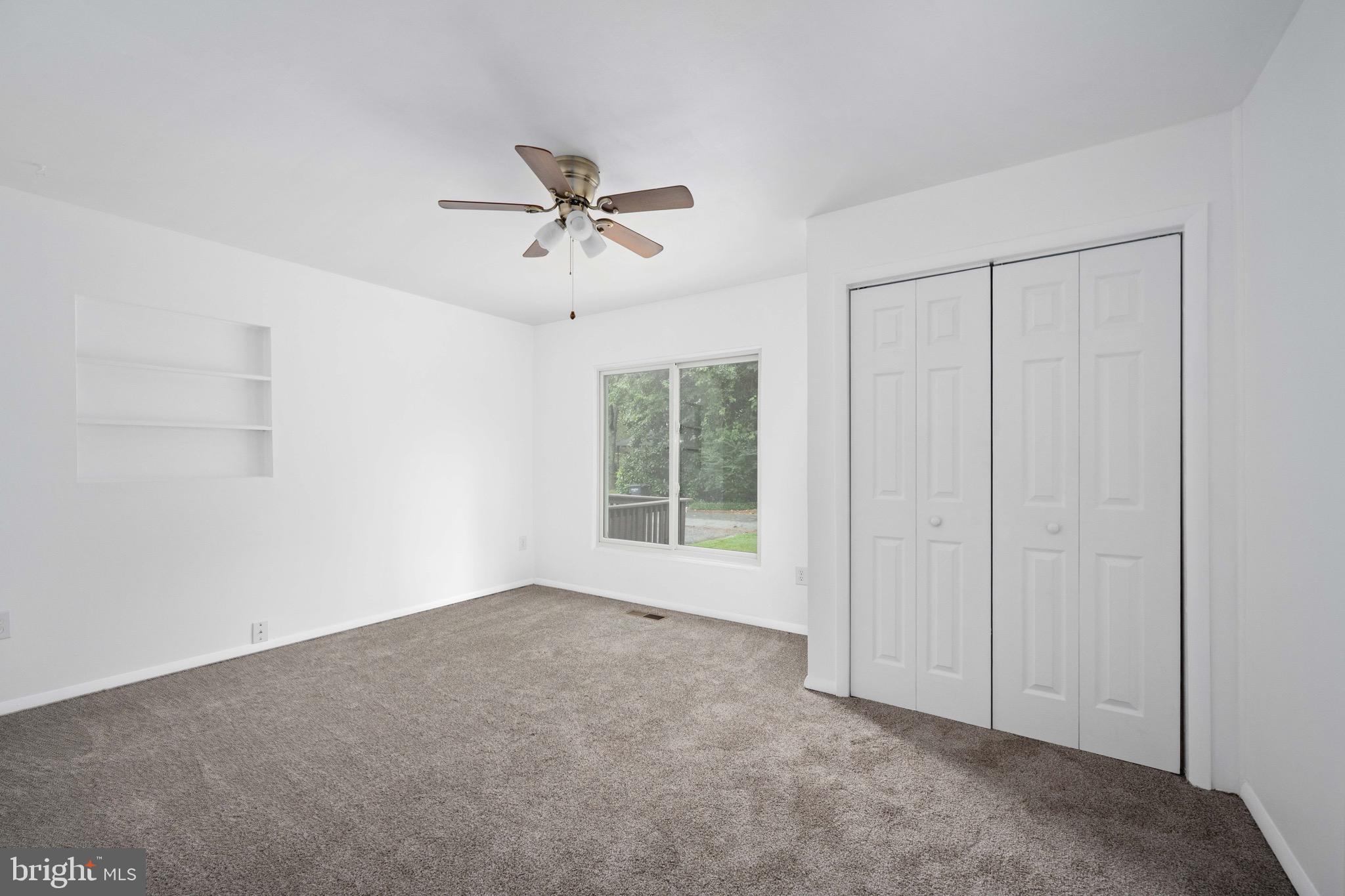161 8th Street Colonial Beach, VA 22443 - Photo 27 of 71 a view of an empty room with a window