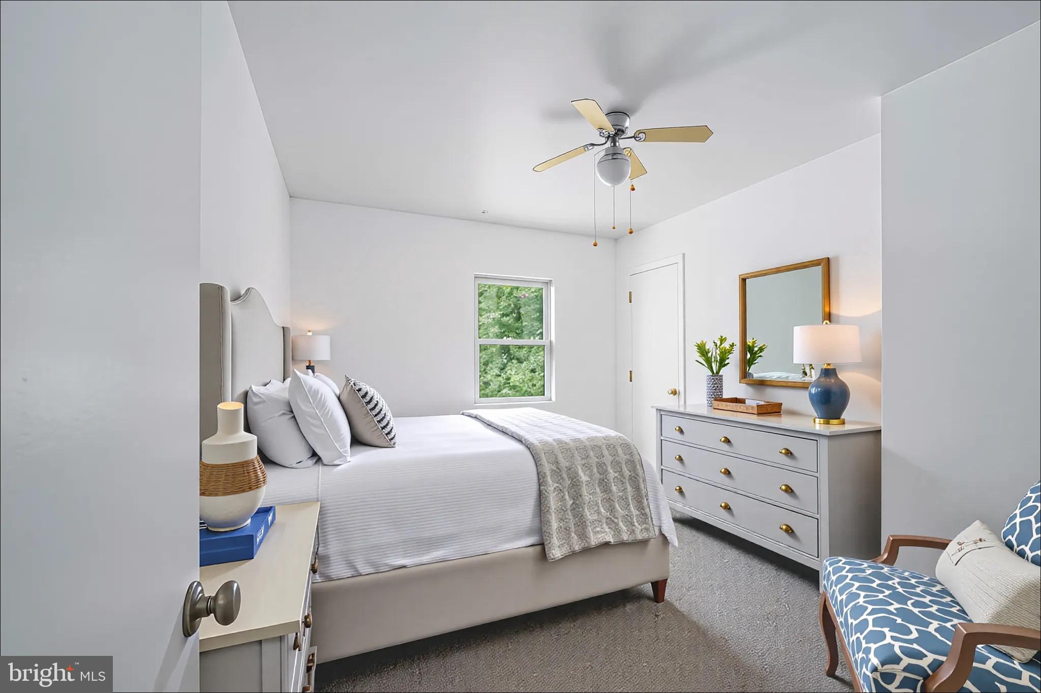 161 8th Street Colonial Beach, VA 22443 - Photo 30 of 71 a bedroom with a bed and a window