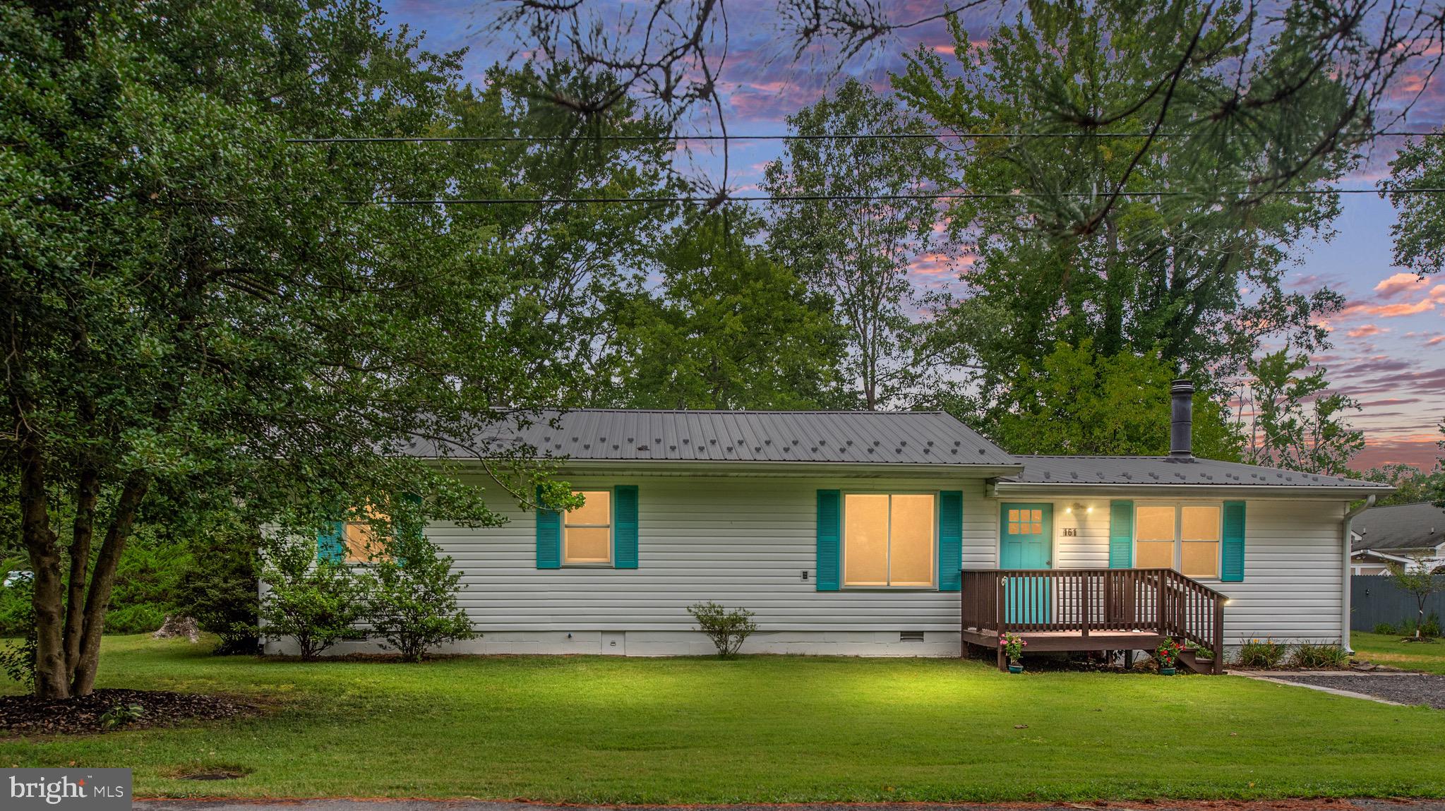 161 8th Street Colonial Beach, VA 22443 - Photo 59 of 71 a front view of a house with a yard