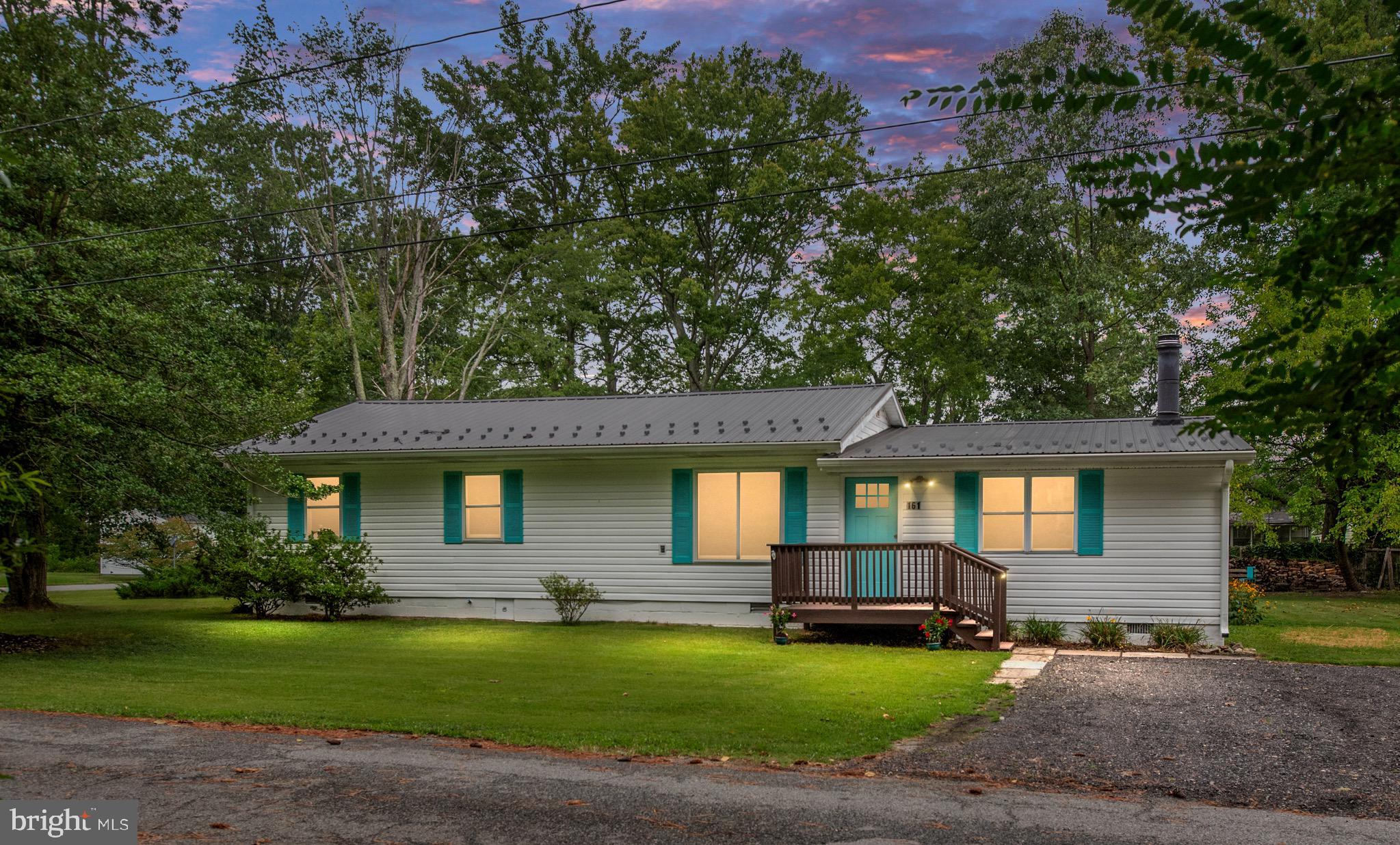 161 8th Street Colonial Beach, VA 22443 - Photo 60 of 71 a front view of a house with a yard