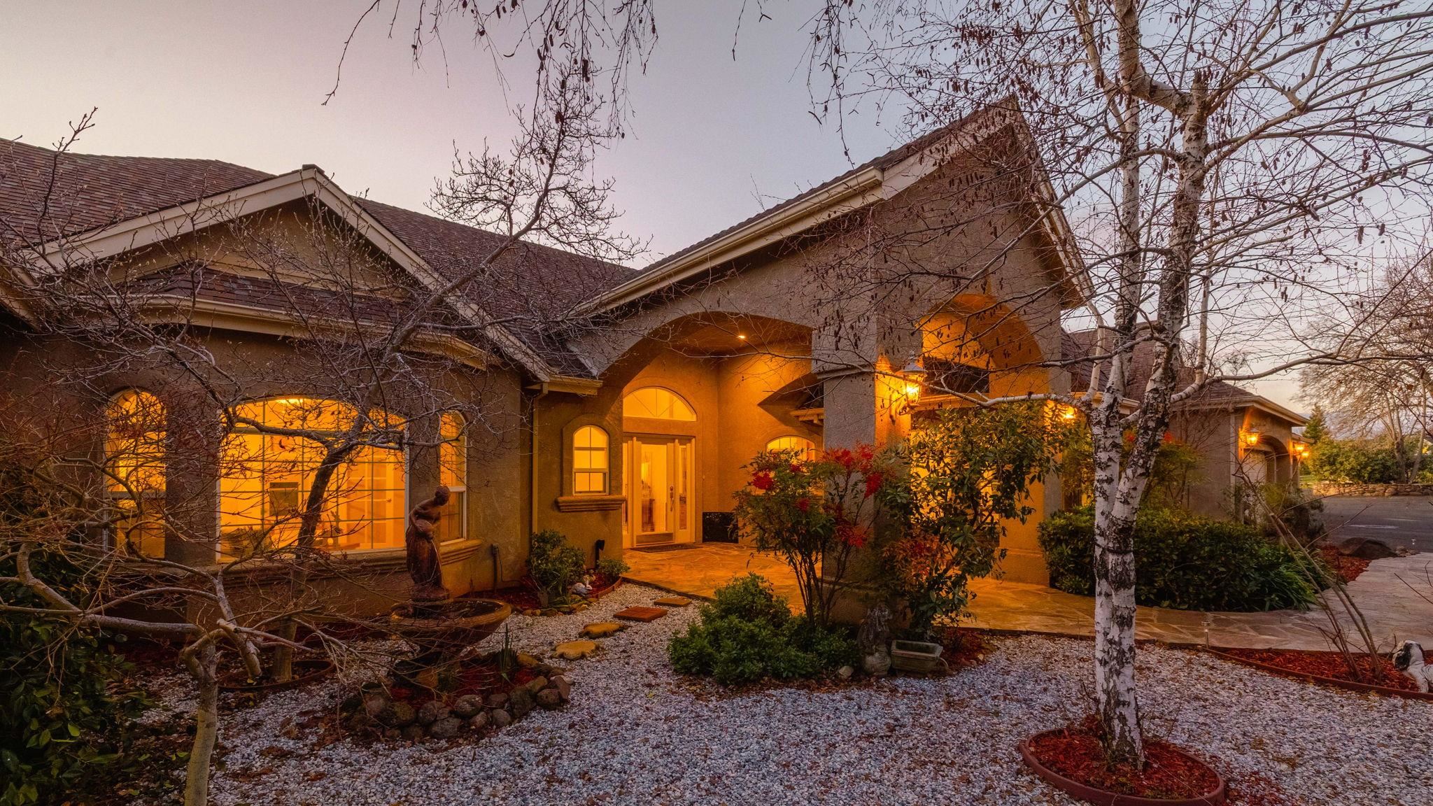 View of front of house with stucco siding