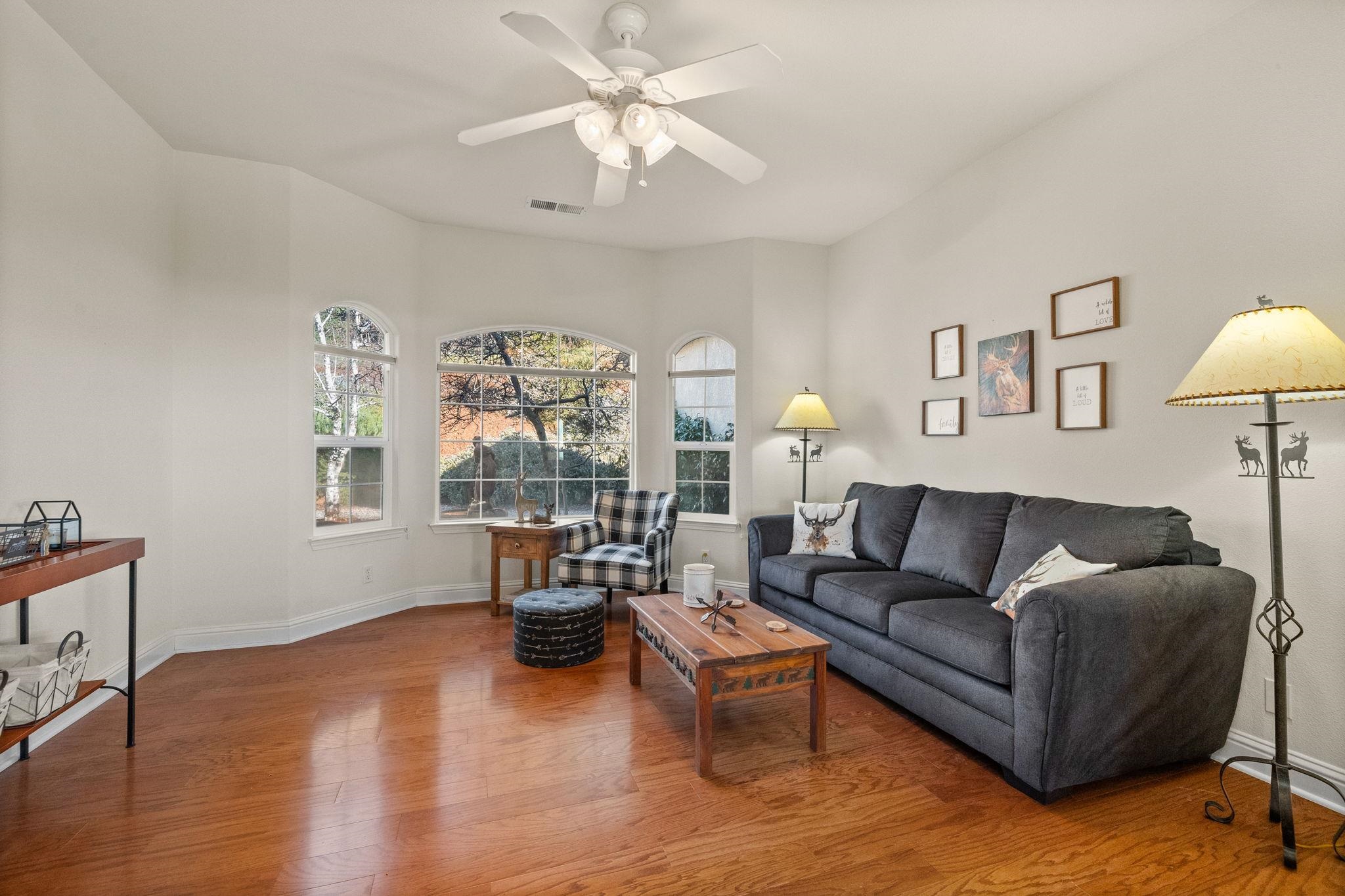 17550 Old Wards Ferry Road Sonora, CA 95370 - Photo 16 of 59 Living room featuring light wood finished floors and ceiling fan