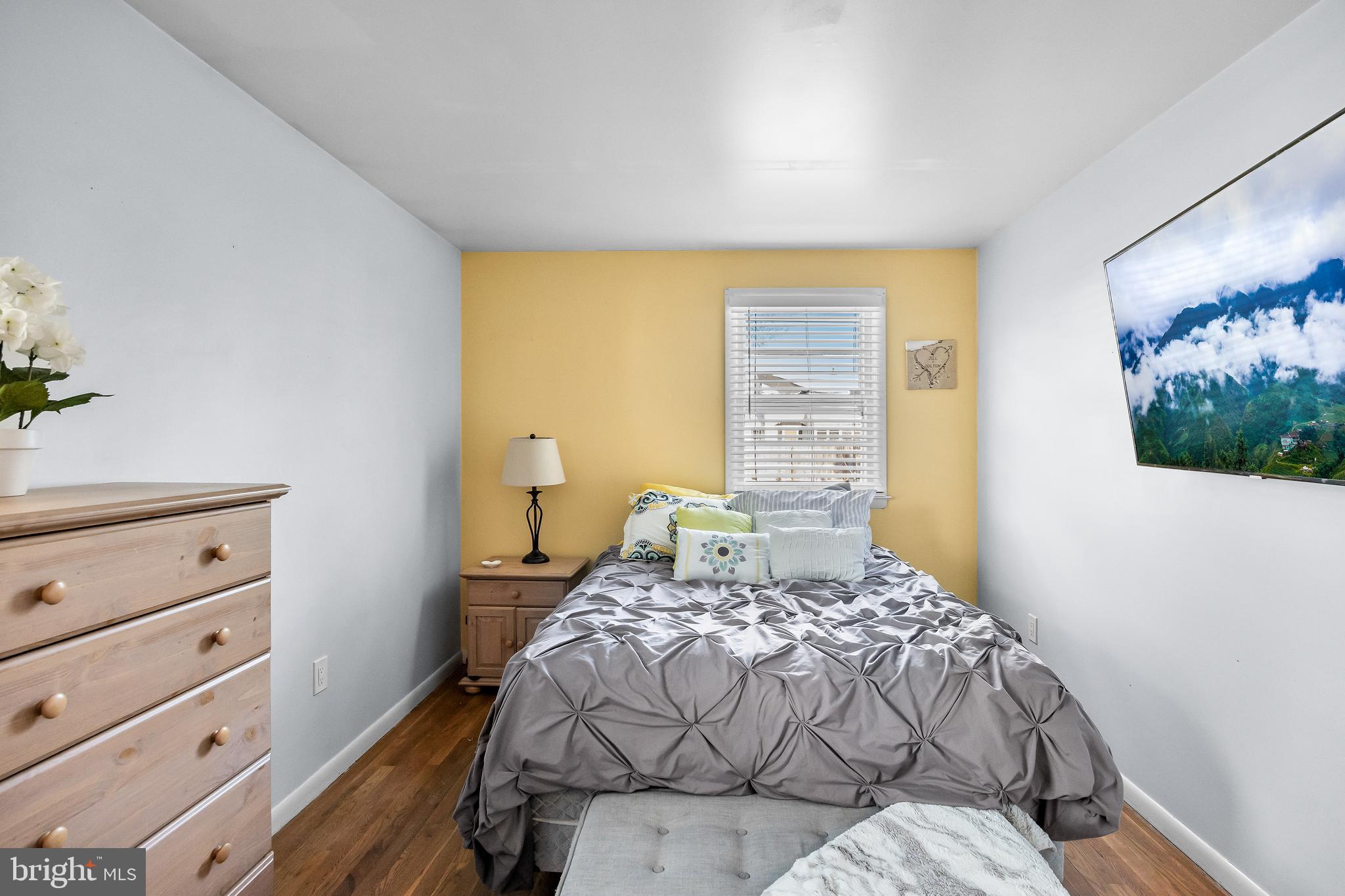 409 Lippincott Avenue Riverside, NJ 08075 - Photo 15 of 25 a bedroom with a bed and a window
