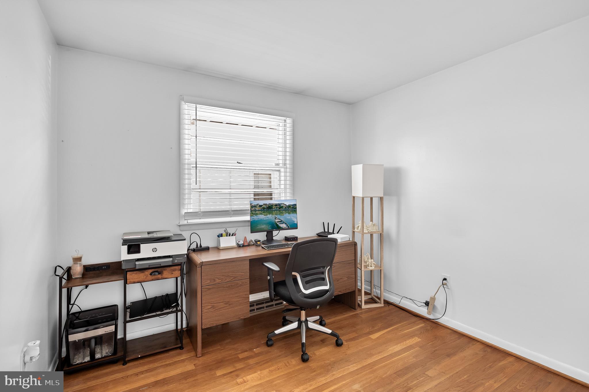 409 Lippincott Avenue Riverside, NJ 08075 - Photo 18 of 25 a view of a workspace with furniture and a window