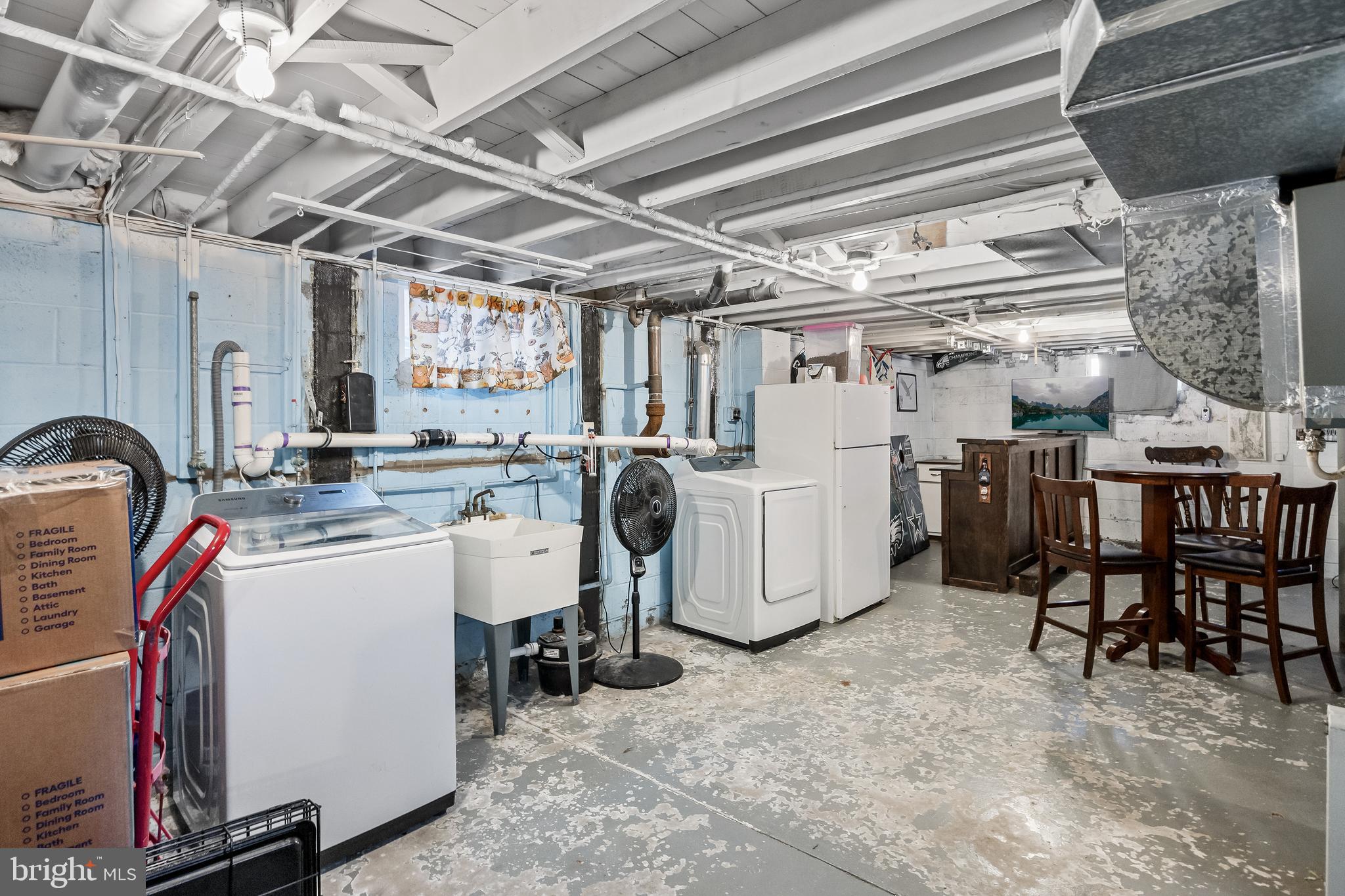 409 Lippincott Avenue Riverside, NJ 08075 - Photo 23 of 25 a utility room with dryer and washer