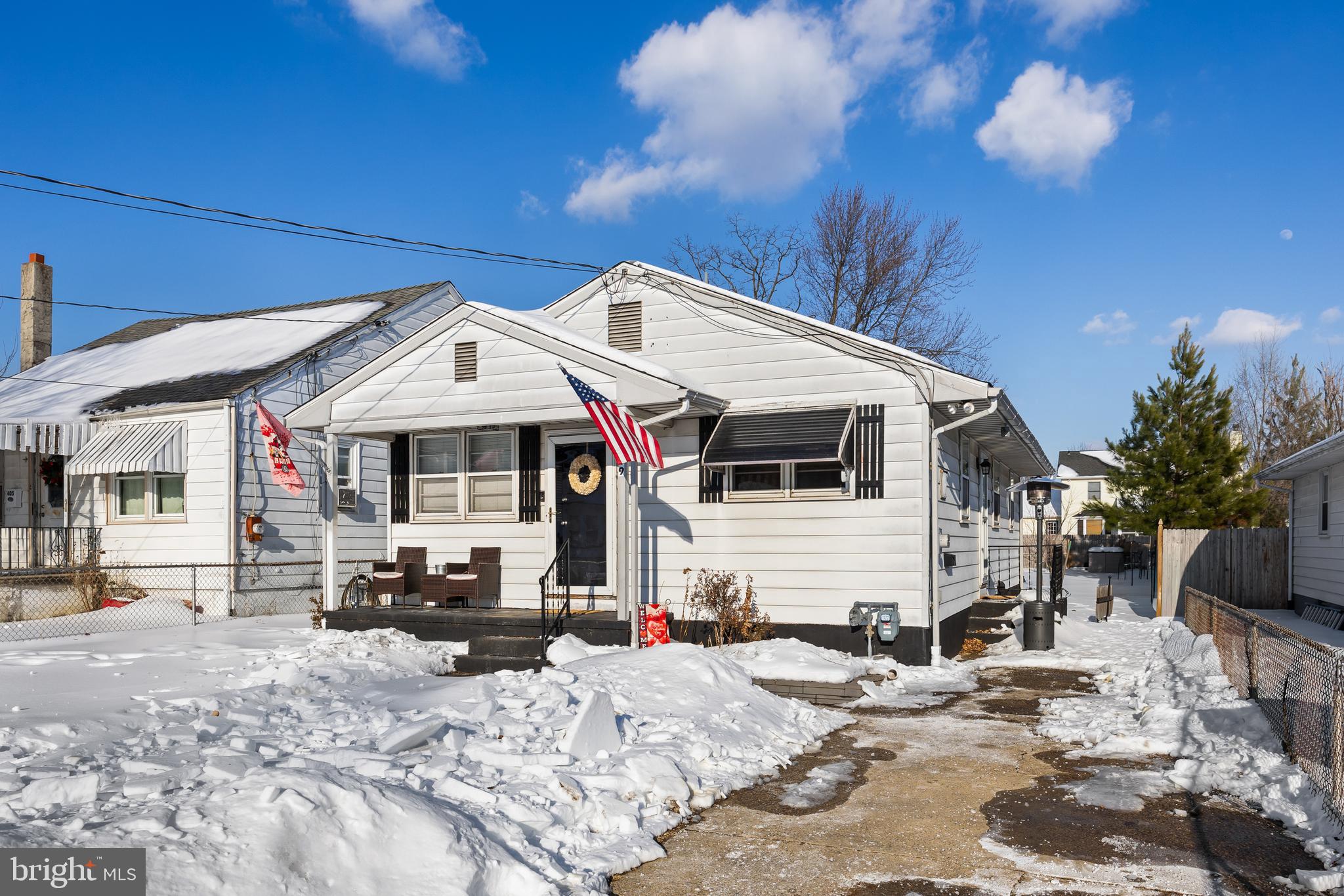 409 Lippincott Avenue Riverside, NJ 08075 - Photo 3 of 25 a front view of a house with a patio