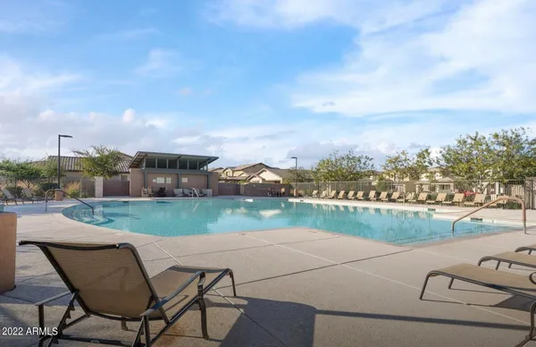 a view of a terrace with yard and lake view
