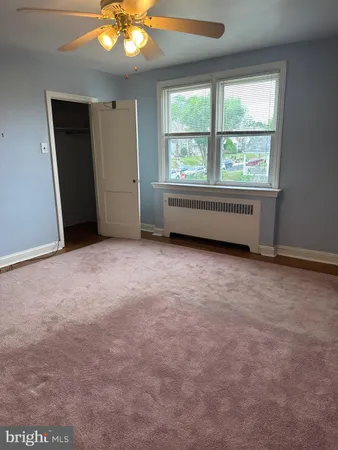 an empty room with window