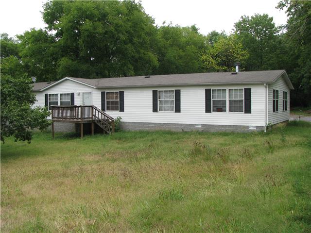 221 Larkin Springs Road Madison, TN 37115 - Photo 1 of 2 a front view of a house with garden