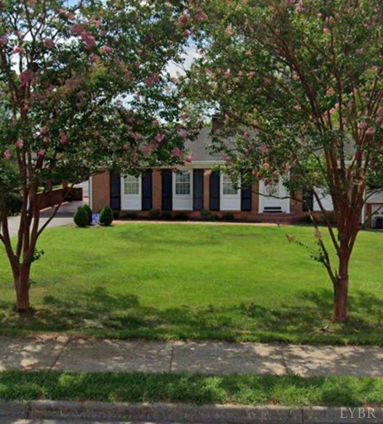 336 North Main Street Amherst, VA 24521 - Photo 2 of 60 a front view of a house with yard and green space