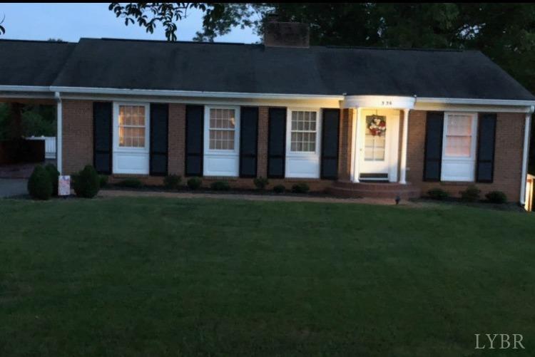 336 North Main Street Amherst, VA 24521 - Photo 4 of 60 a front view of a house with a garden