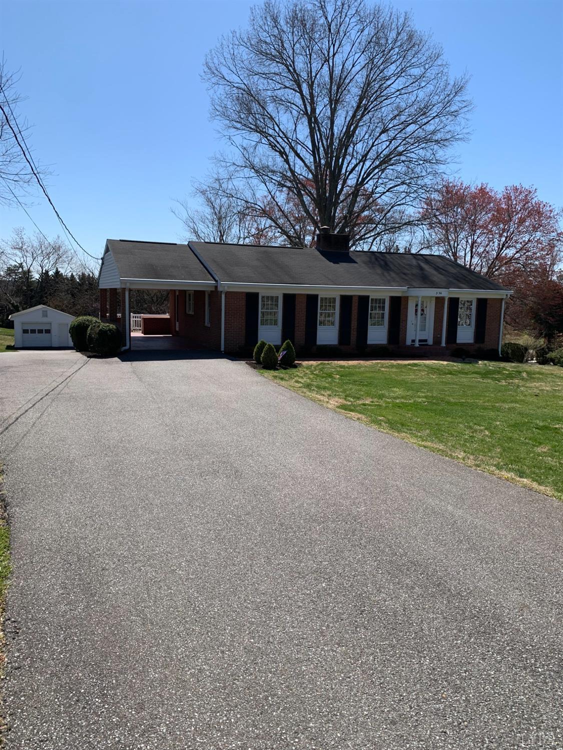 336 North Main Street Amherst, VA 24521 - Photo 5 of 60 a front view of house with yard and trees