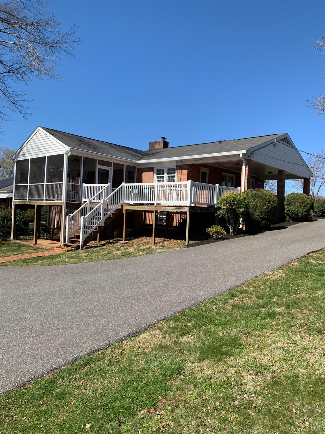 336 North Main Street Amherst, VA 24521 - Photo 55 of 60 a front view of a house with a yard and garage