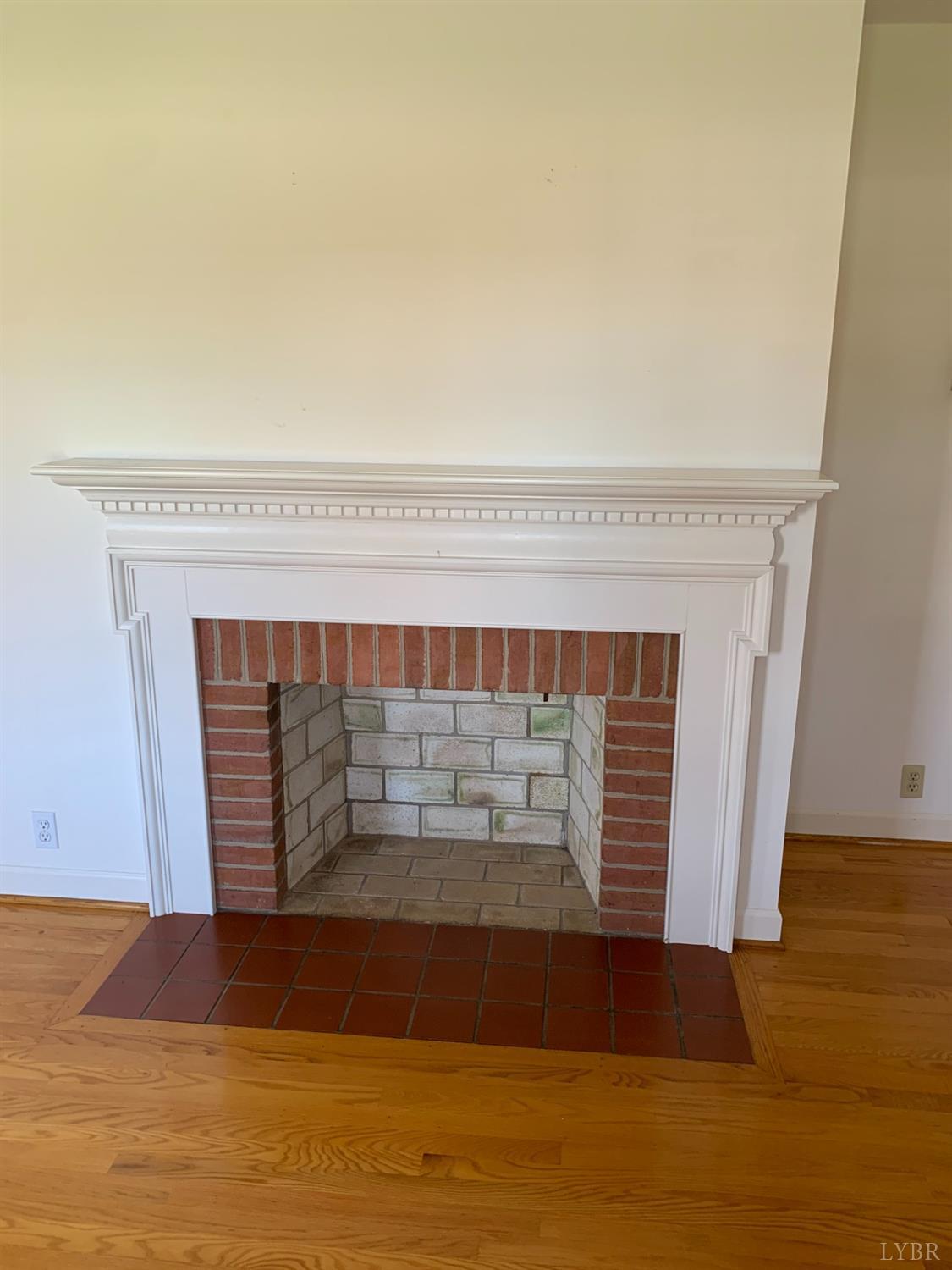 336 North Main Street Amherst, VA 24521 - Photo 9 of 60 a view of fireplace and wooden floor