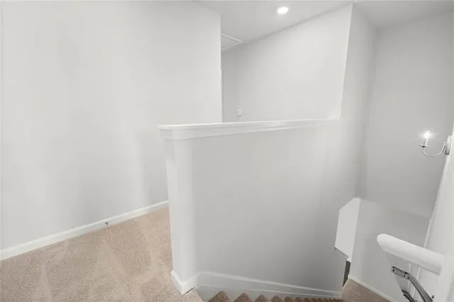 a view of a kitchen with wooden floor and a kitchen
