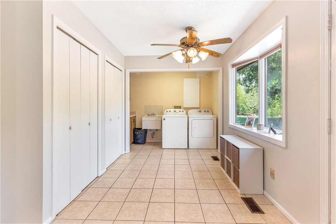 102 Rockingham Road Seneca, SC 29672 - Photo 15 of 39 This spacious utility room offers practical functionality and abundant natural light.