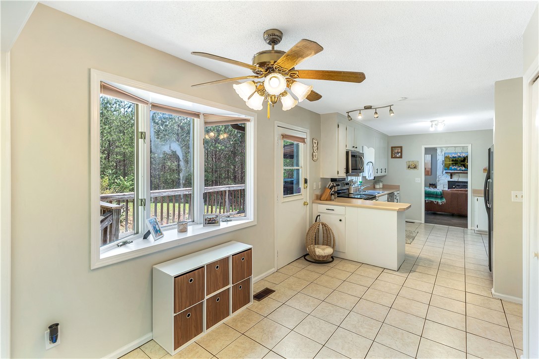 102 Rockingham Road Seneca, SC 29672 - Photo 16 of 39 This bright kitchen features a functional layout and expansive window views.