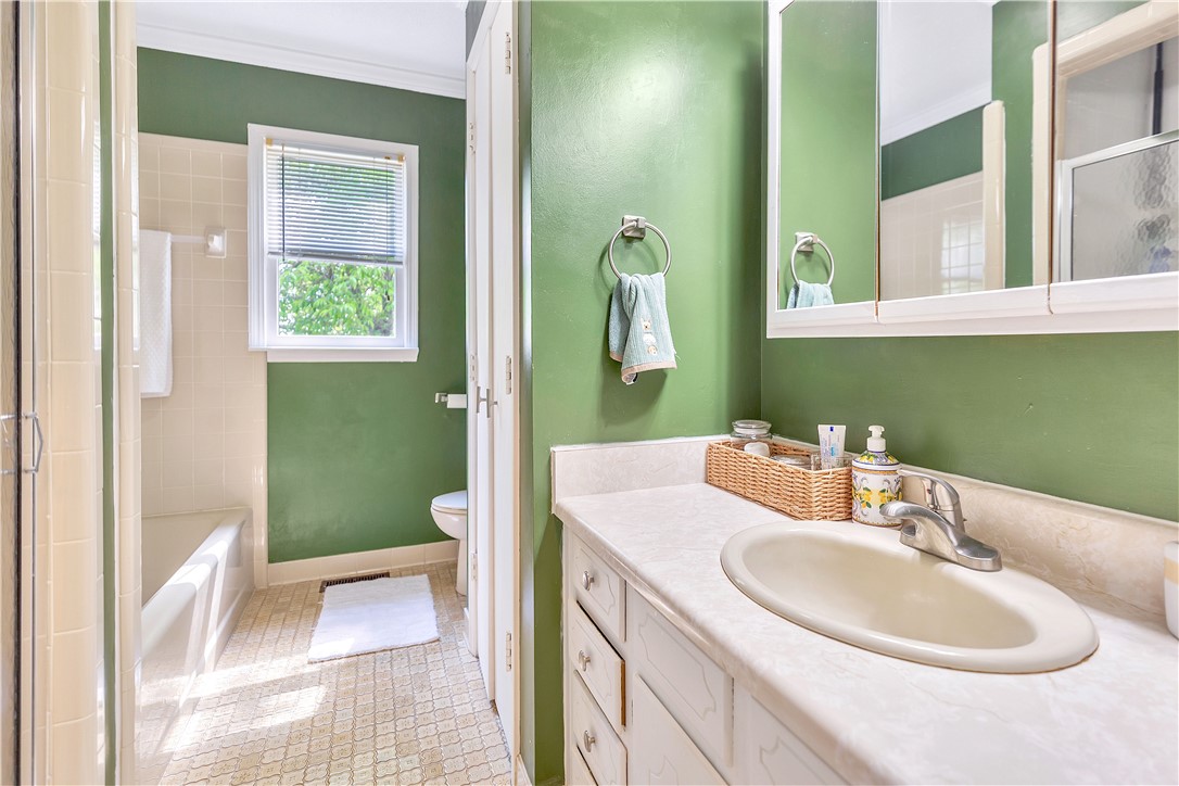 102 Rockingham Road Seneca, SC 29672 - Photo 20 of 39 This bright bathroom features a clean vanity and ample natural light, perfect for daily routines.