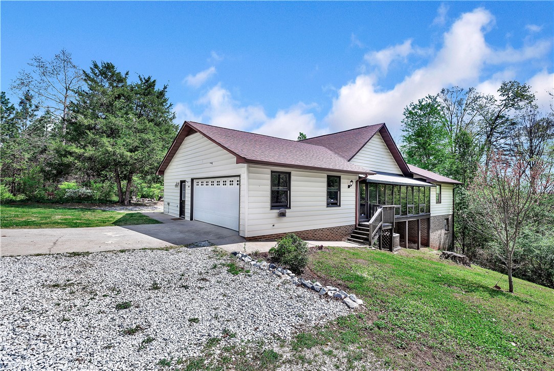 102 Rockingham Road Seneca, SC 29672 - Photo 2 of 39 This captivating residence presents a perfect blend of comfort and outdoor allure.