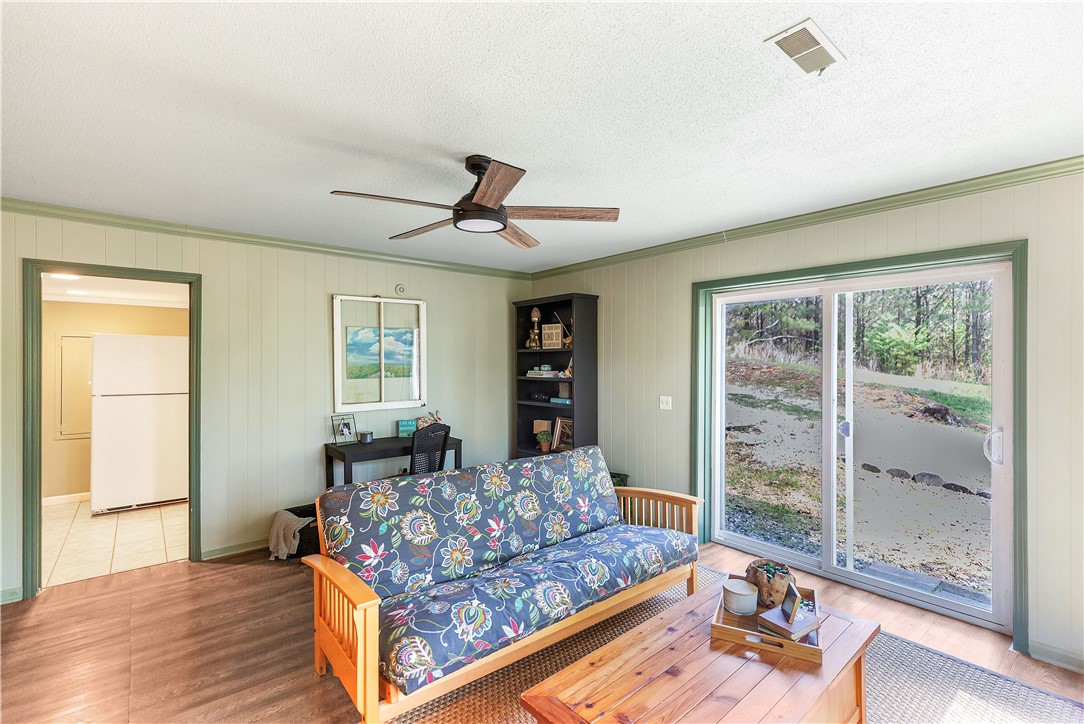 102 Rockingham Road Seneca, SC 29672 - Photo 28 of 39 This living area features ample natural light and direct outdoor access.