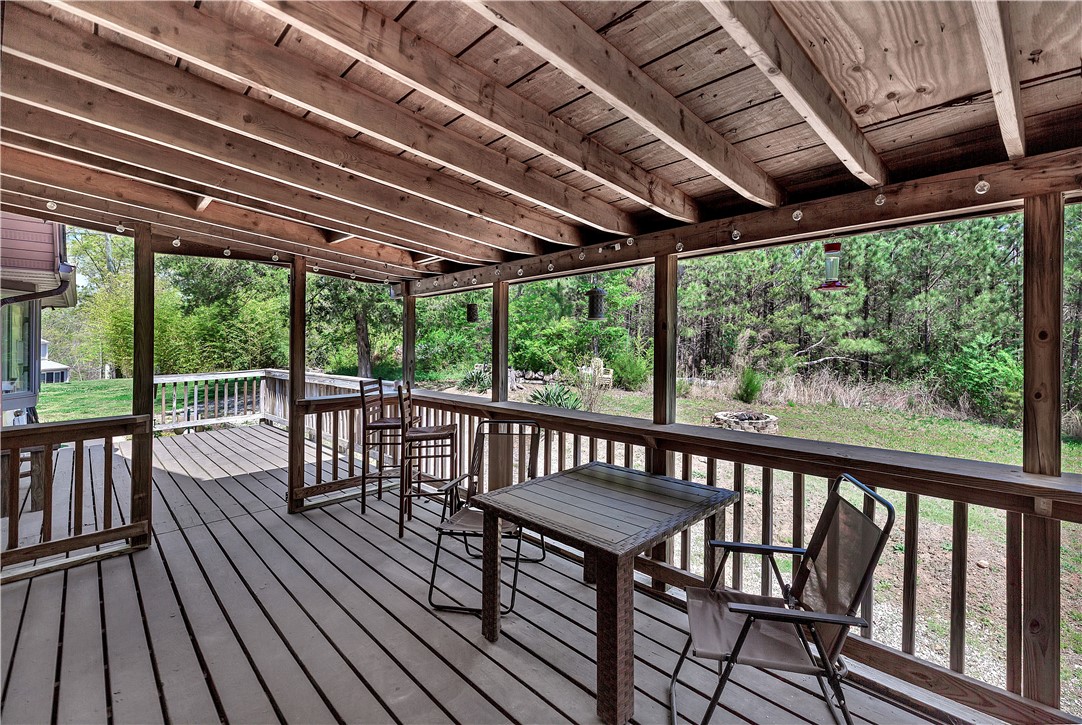 102 Rockingham Road Seneca, SC 29672 - Photo 32 of 39 Enjoy outdoor living and expansive nature views from this charming covered deck.