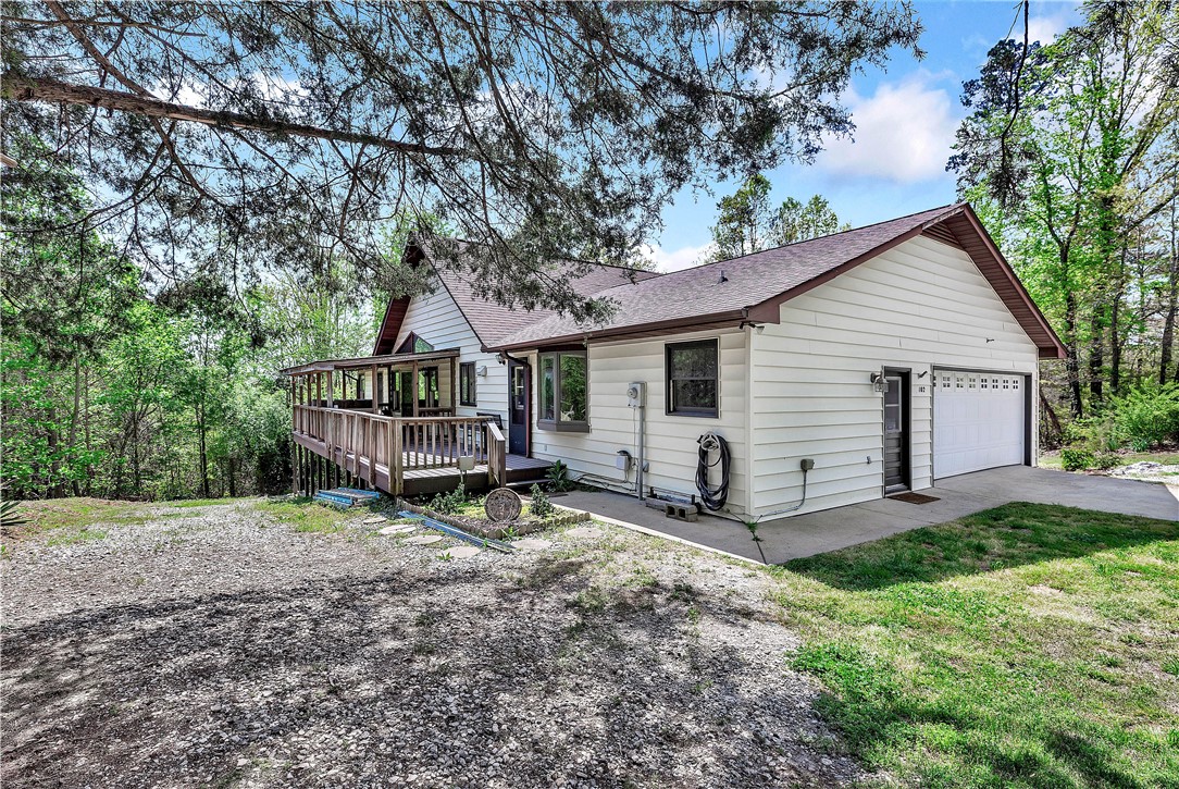 102 Rockingham Road Seneca, SC 29672 - Photo 36 of 39 This charming residence features an inviting deck, perfect for outdoor living, and an attached garage.
