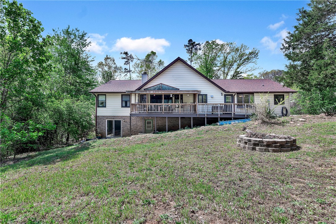 102 Rockingham Road Seneca, SC 29672 - Photo 38 of 39 This charming home offers outdoor living with a spacious deck and a dedicated fire pit area.