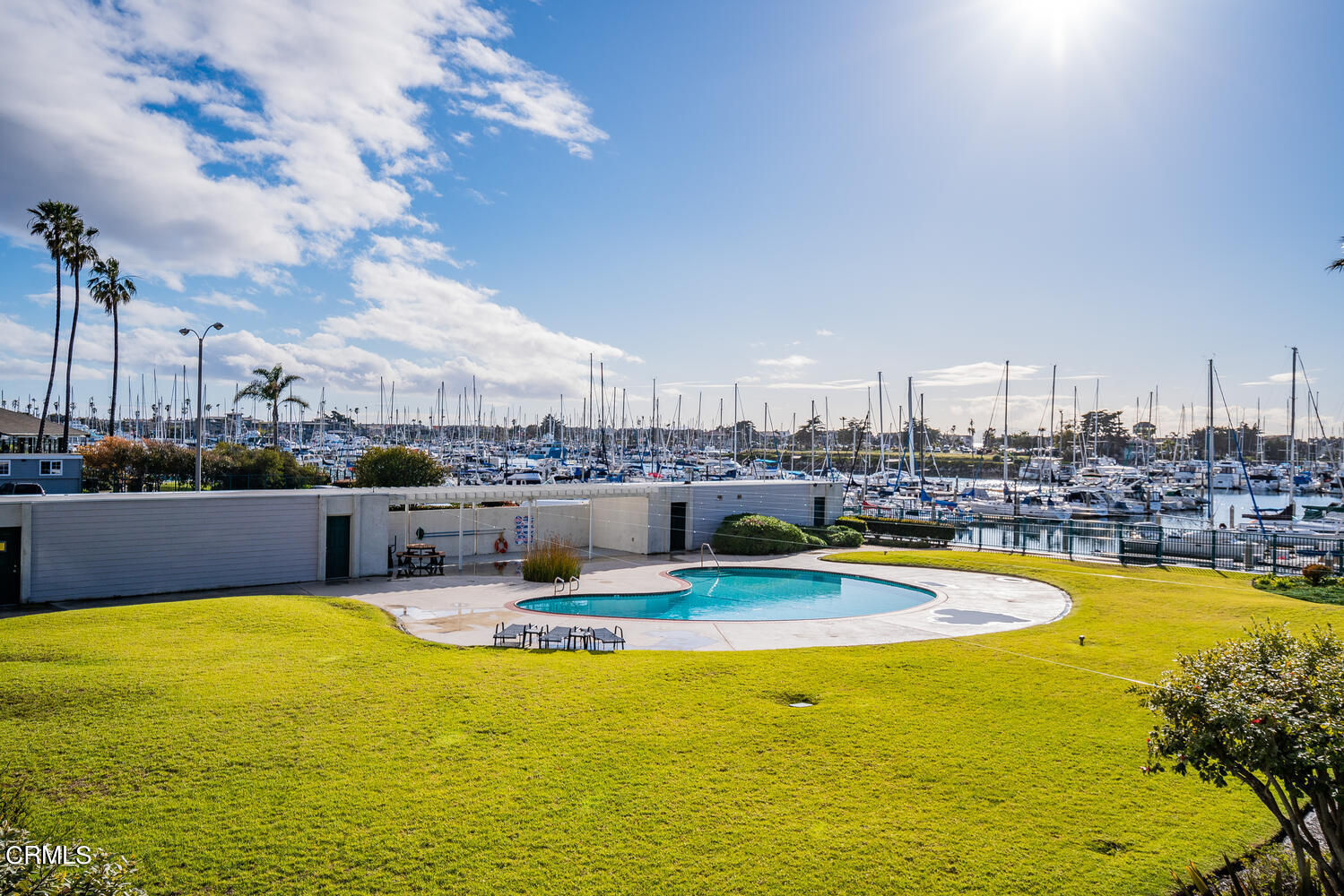 2901 Peninsula Road, Unit 134 Oxnard, CA 93035 - Photo 16 of 31 a view of a swimming pool with outdoor seating
