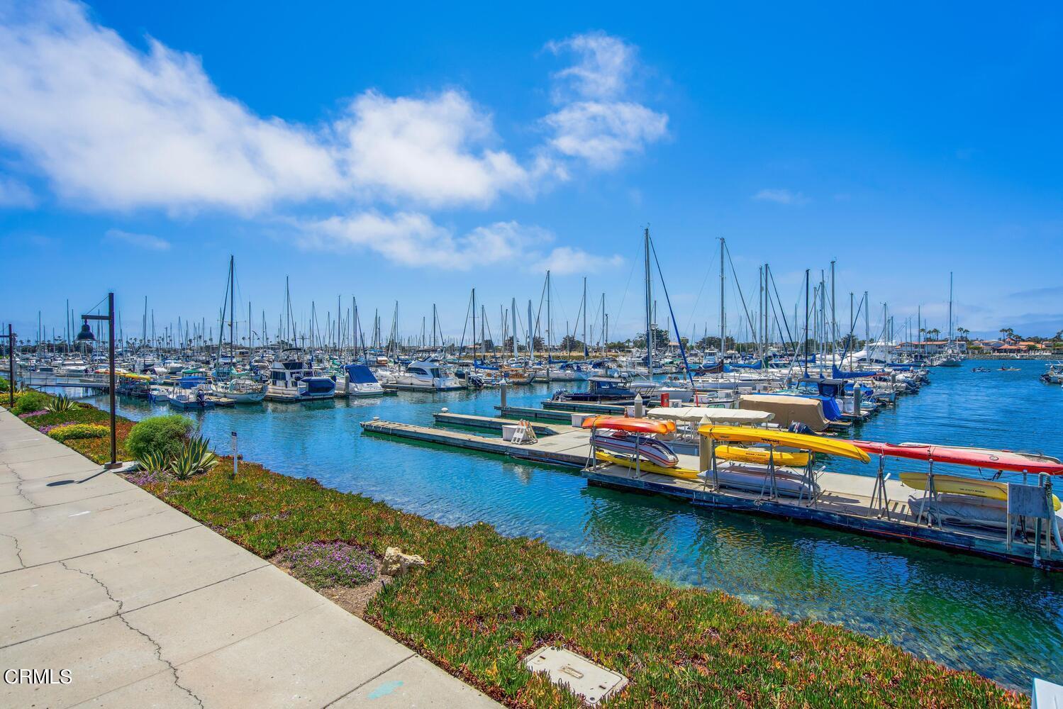 2901 Peninsula Road, Unit 134 Oxnard, CA 93035 - Photo 30 of 31 a view of swimming pool with outdoor seating and yard
