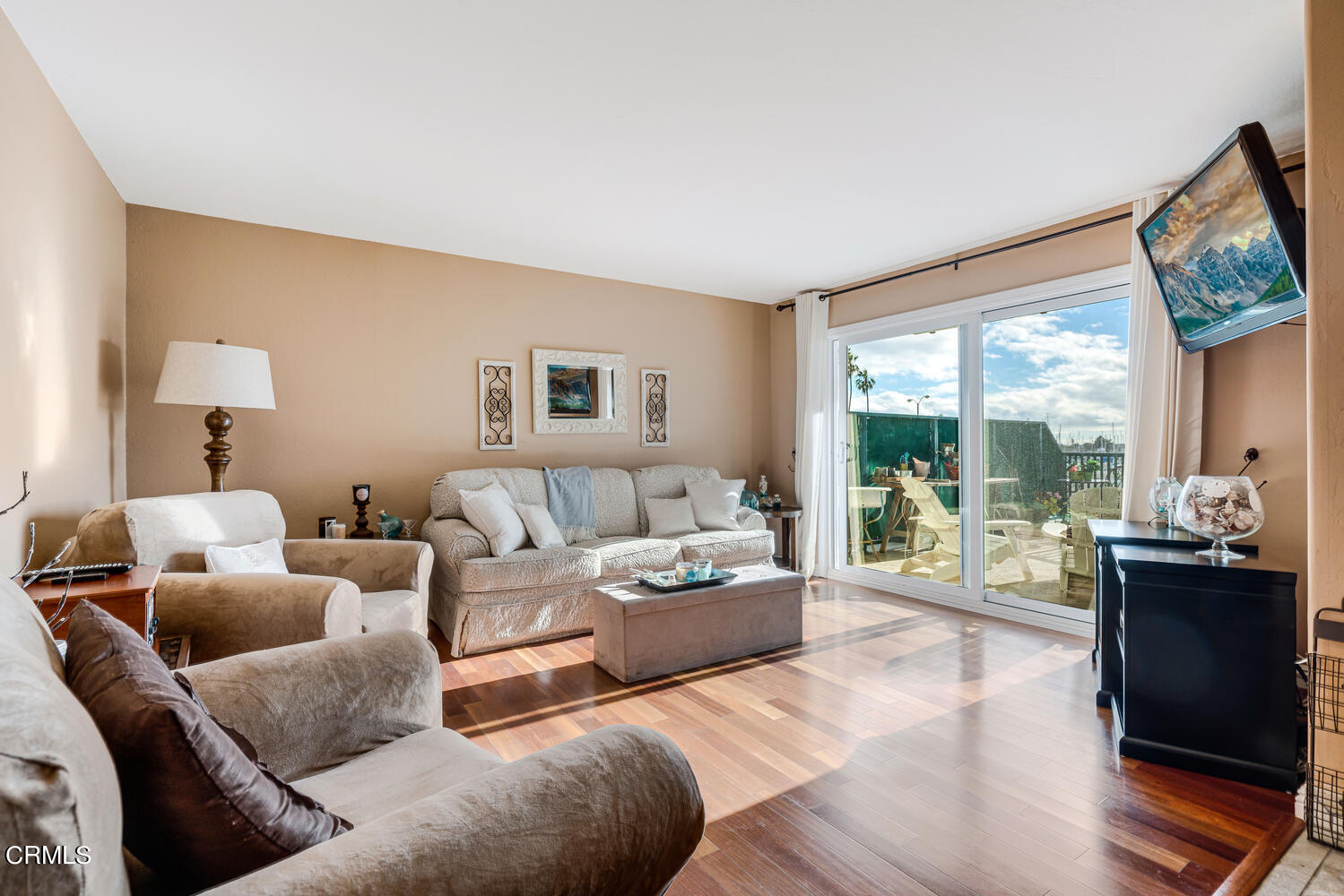 2901 Peninsula Road, Unit 134 Oxnard, CA 93035 - Photo 4 of 31 a living room with furniture and a large window