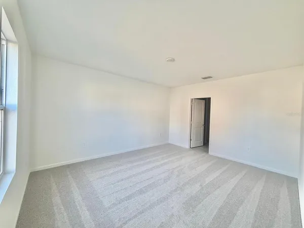 an empty room with an empty room