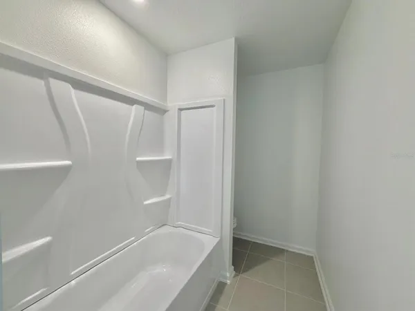 a bathroom with a bathtub