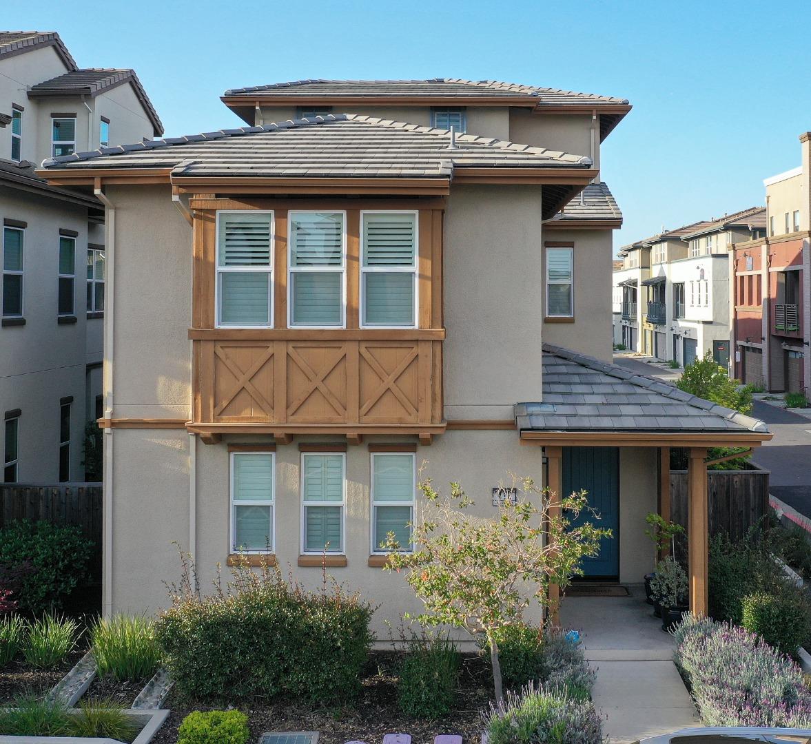 416 Singleton Avenue Alameda, CA 94501 - Photo 1 of 1 a view of brick house with large windows and a small yard